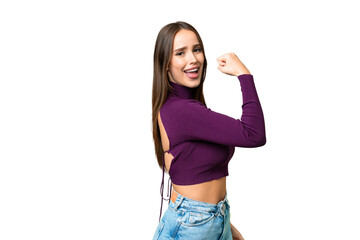 Young beautiful woman over isolated chroma key background doing strong gesture
