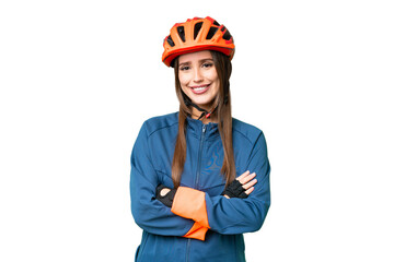 Young cyclist woman over isolated chroma key background keeping the arms crossed in frontal position - obrazy, fototapety, plakaty