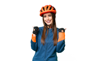 Young cyclist woman over isolated chroma key background with thumbs up gesture and smiling