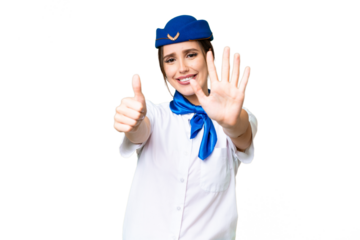 Airplane stewardess over isolated chroma key background counting six with fingers