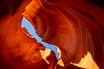 looking up the antelope canyon illuminated in red color