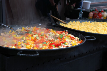 Street fresh vegetables food cooking green cucumbers red tomatoes mushrooms corn porridge macro background 