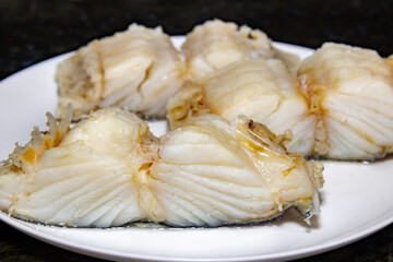 Traditional Portuguese Cod Fish in slices in selective focus