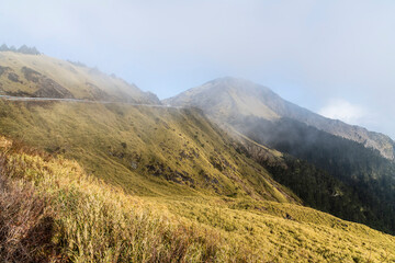 Naklejka premium Layers of magnificent mountains landscape in Hehuanshan of Nantou, Taiwan. Taroko National Park is one of Taiwan's most popular tourist attractions. 