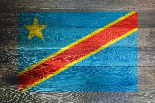 Democratic Republic of Congo flag on rustic old wood surface background