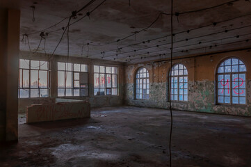 Old abandoned haunted red brick factory of stockings, pantyhose and socks in Central Europe, Poland