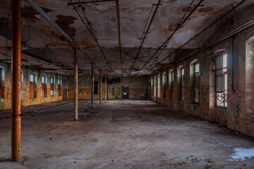 Old abandoned haunted red brick factory of stockings, pantyhose and socks in Central Europe, Poland