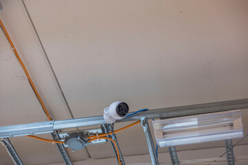 Close up view of safety camera in warehouse. Security concept. Sweden. 