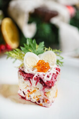 Obraz na płótnie Canvas beetroot salad with caviar on Christmas table