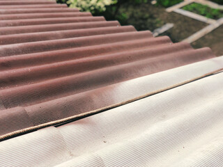 Painting a slate roof with a high pressure compressor