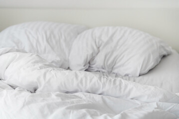 Fototapeta na wymiar bed at home bedroom, white pillows