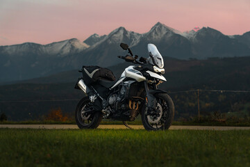 Fototapeta na wymiar Triumph Tiger motorcycle in mountains