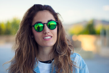 Portrait of a pretty girl in sunglasses