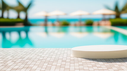Empty ceramic mosaic table top and blurred swimming pool in tropical resort in summer banner background, for display or montage your products