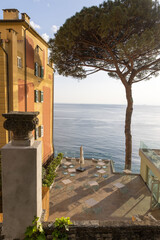 Terrace with bathing buns facing Mediterranean sea  in Camogli, a fishing village and resort close to the peninsula of Portofino, in the Riviera di Levante, Genoa Liguria Italy