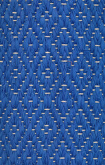 Closeup of handwoven rag rug in blue shades.