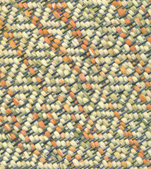 Closeup of handwoven rag rug in pastel colors
