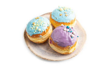 Purple and blue glazed donut isolated on white, side view.