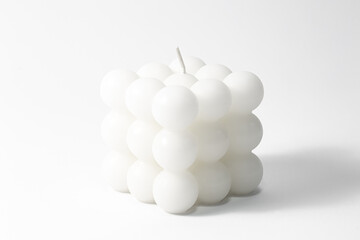 White candle square shape on a white background isolated.