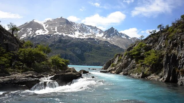 remote patagonian landscape with mountains and a waterfall at Perito Moreno national park, lago Azara