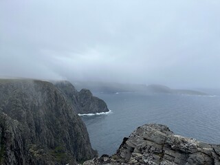 view of the mountains and the water at the famous north cape in norway.