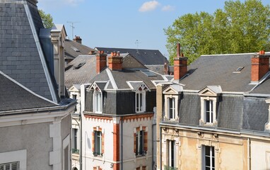 View from the window, roofs and floors of old houses in the city, view from above.