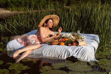 Picnic with a girl on the water