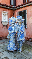 Fototapeta na wymiar Portrait of a disguised Couple - Venice Carnival 2012