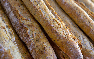 Stack of crispy baguettes at the bakery