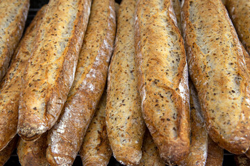 Stack of crispy baguettes at the bakery