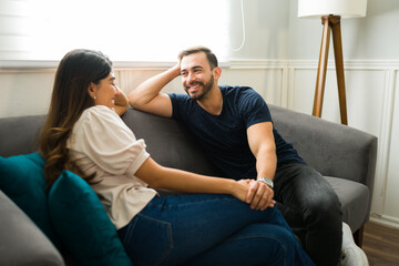 Man holding hands with his girlfriend on a casual date