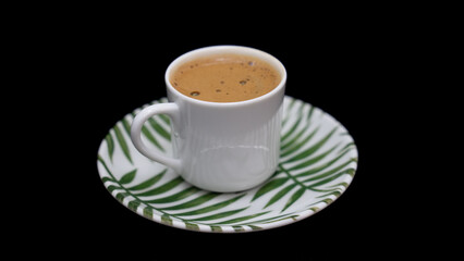 Turkish and Arabic Traditional Hot Coffee or Espresso Drink on rustic wood bar counter, black bacgraund