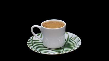 Turkish and Arabic Traditional Hot Coffee or Espresso Drink on rustic wood bar counter, black bacgraund
