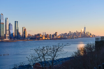 Fototapeta premium Manhattan skyline buildings in perfect setting sunlight, saturated background graphic resources travel photo
