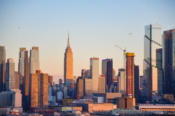 Manhattan skyline buildings in perfect setting sunlight, saturated background graphic resources travel photo
