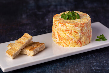 Food photography of cheese salad, eggs, carrot, garlic, toast, mayonnaise