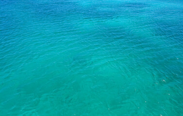 Azure Caribbean sea calm and clear water. Blue aqua marine background.	