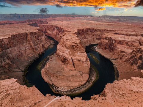 Panorama of Horseshoe Bend, Page Arizona. The Colorado River and a land mass made of orange sandstone. Made of twenty-three images, not one hundred percent accurate for perspective.