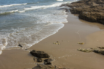 waves reaching the beach in the Cantabrian sea