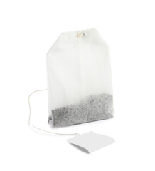 New tea bag with tab isolated on white - obrazy, fototapety, plakaty