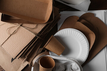 Heap of waste paper on table, top view