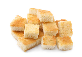 Pile of delicious crispy croutons on white background