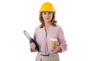 portrait of smiling woman architect in helmet holding clipboard folder and takeway coffee cup, isolated on white background
