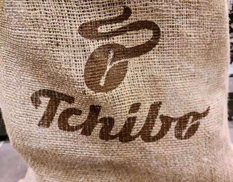 Kiel, Germany - 27.December 2022: A close-up of a Tchibo logo on an old coffee bag.