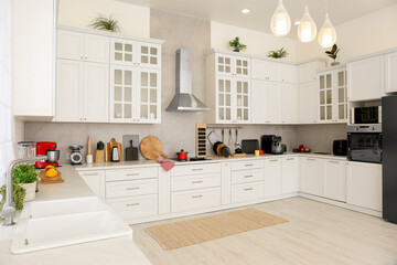 Beautiful kitchen interior with stylish modern furniture