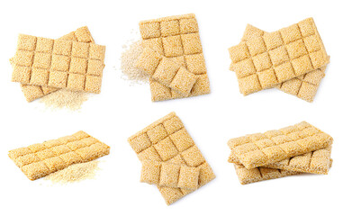 Delicious sesame kozinaki bars on white background
