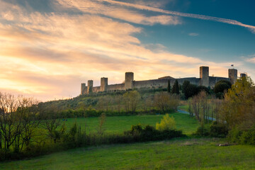 Sunset over the medieval fortified town of Monteriggioni, Tuscany,  Italy
