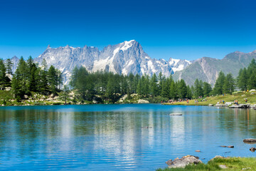 Beautiful reflection of the Mont Blanc on the Arpy Lake, Aosta Valley,  Italy