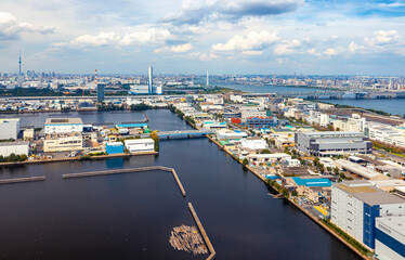 Fototapeta na wymiar Aerial view of Odaiba Harbor shipping freight docks in Minato City, Tokyo, Japan