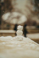 Small snowman being built